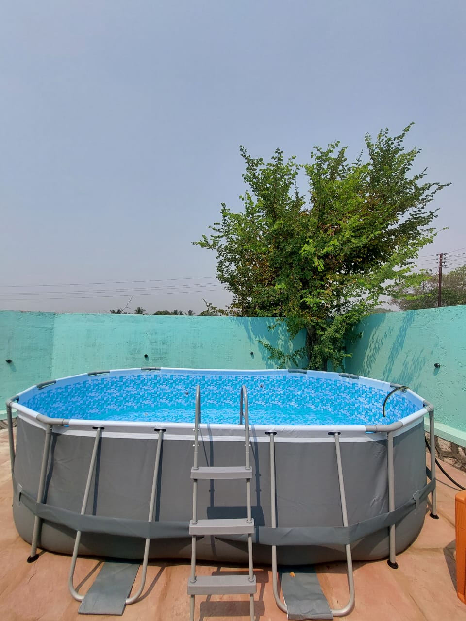 Bestway Power Steel 16' x 10' x 42" Oval Frame Swimming Pool Set with Filter, Ladder and Cover